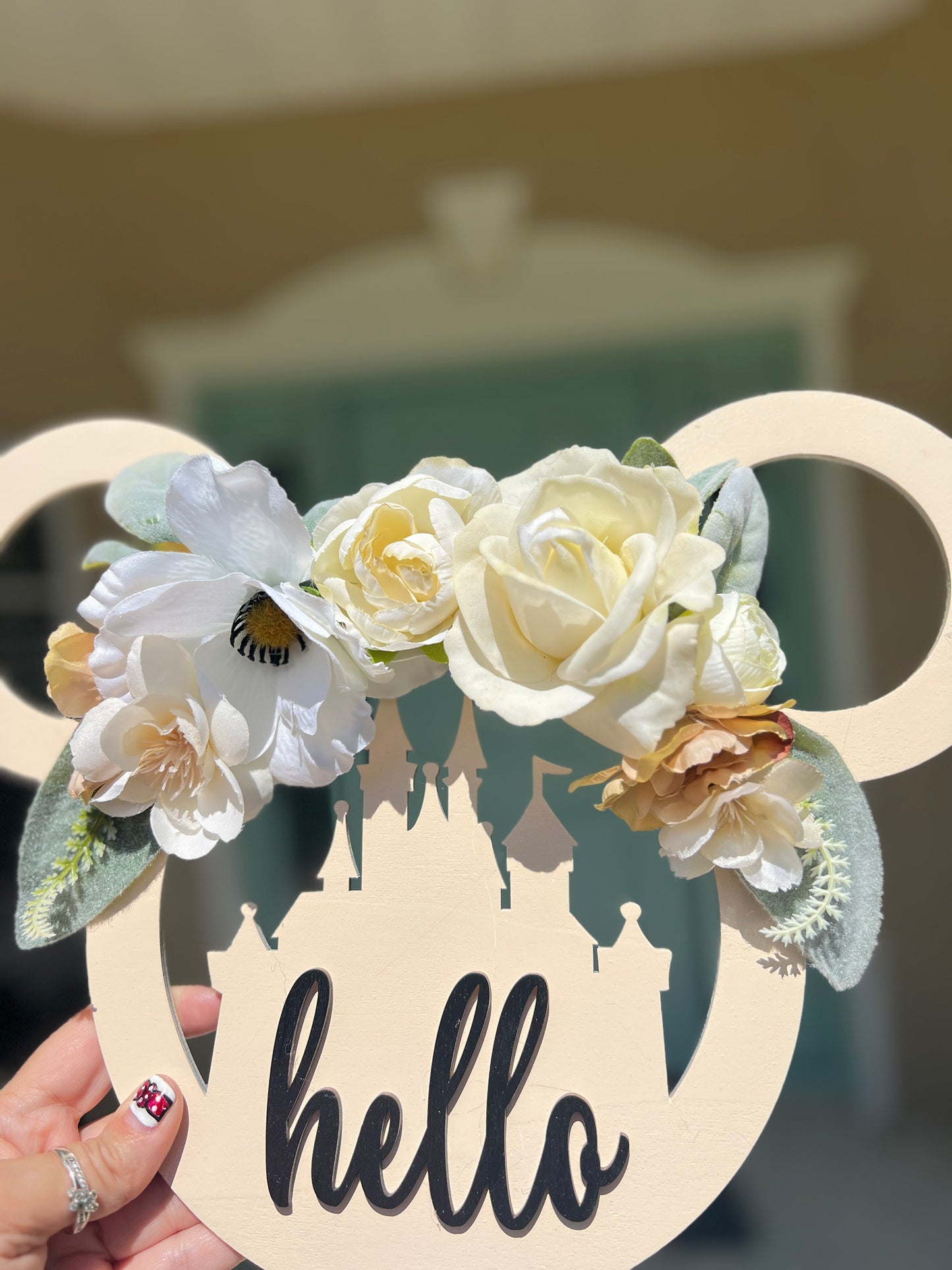 Disney Mickey icon sign with flowers