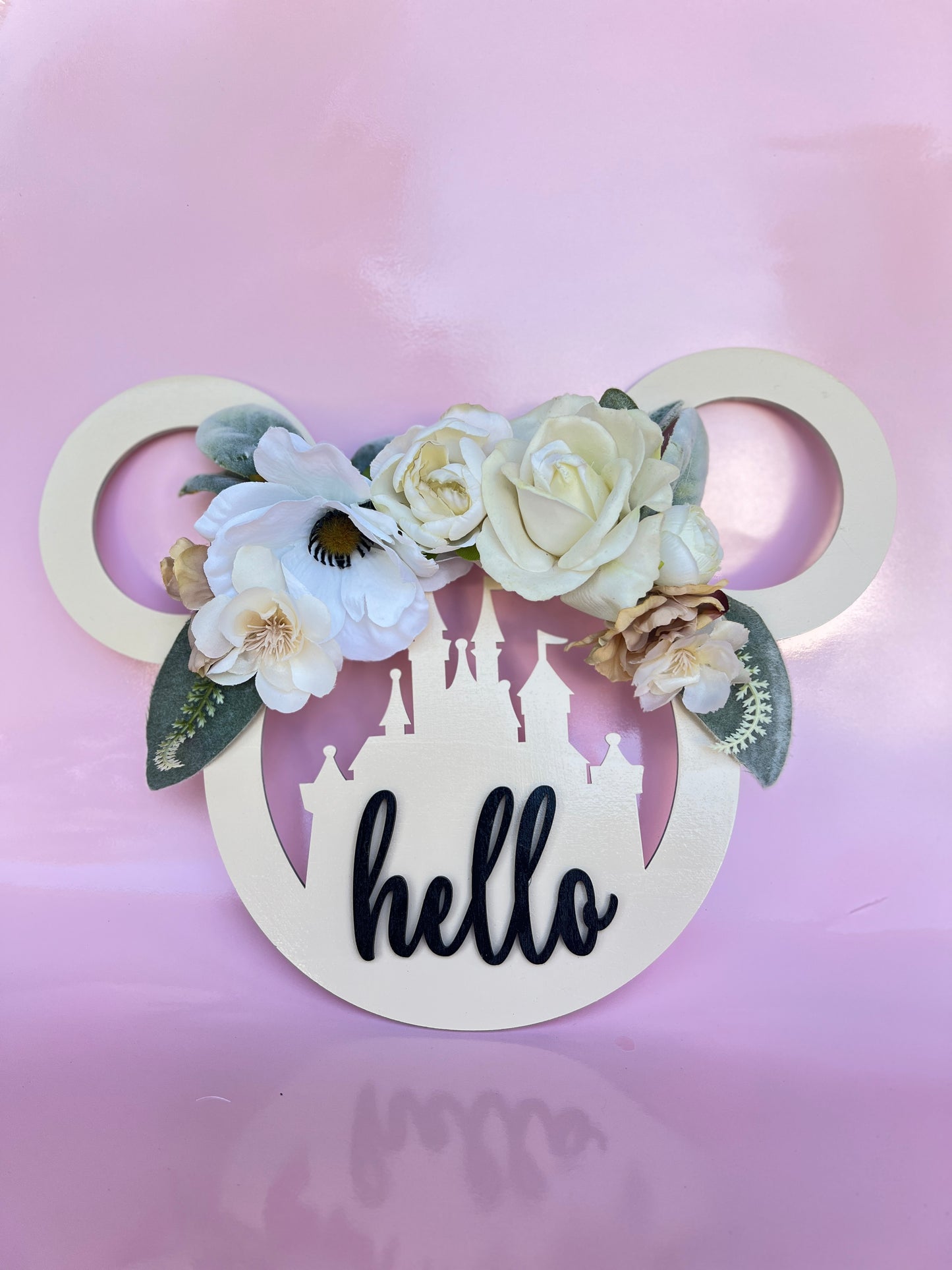 Disney Mickey icon sign with flowers